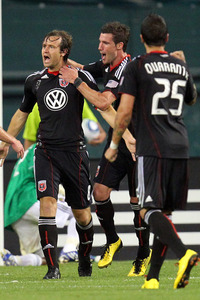 United captain Carey Talley celebrates his winning penalty kick goal