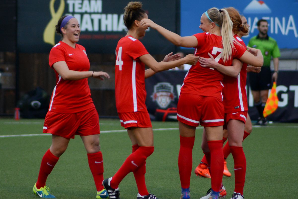 Washington Spirit players celebrate following Line Sigvardsen Jensen’s goal